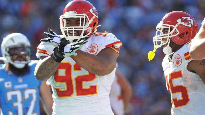 Nov 22, 2015; San Diego, CA, USA; Kansas City Chiefs nose tackle Dontari Poe (92) reacts after scoring a touchdown during the first half of the game against the San Diego Chargers at Qualcomm Stadium. Kansas City won 33-3. Mandatory Credit: Orlando Ramirez-USA TODAY Sports