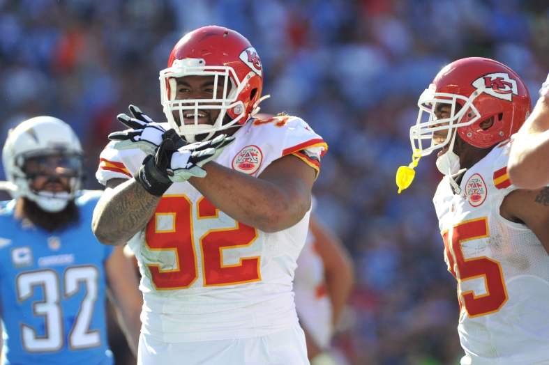 Nov 22, 2015; San Diego, CA, USA; Kansas City Chiefs nose tackle Dontari Poe (92) reacts after scoring a touchdown during the first half of the game against the San Diego Chargers at Qualcomm Stadium. Kansas City won 33-3. Mandatory Credit: Orlando Ramirez-USA TODAY Sports