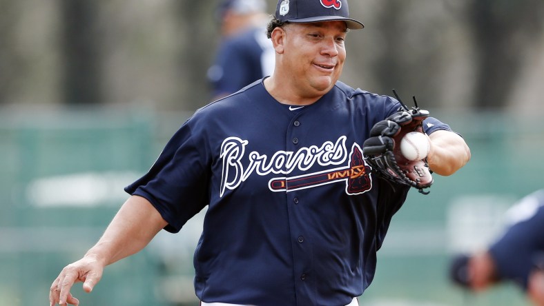 Feb 15, 2017; Lake Buena Vista, FL, USA; Atlanta Braves starting pitcher Bartolo Colon (40) catches a ball while covering first base during MLB spring training workouts at Champion Stadium. Mandatory Credit: Reinhold Matay-USA TODAY Sports