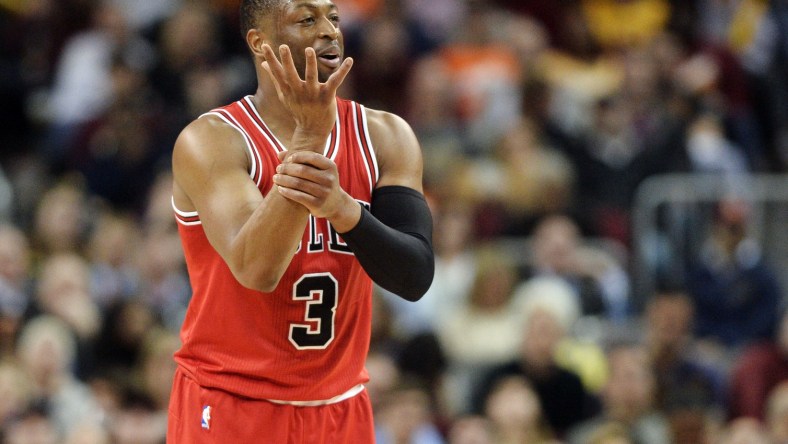 Feb 25, 2017; Cleveland, OH, USA; Chicago Bulls guard Dwyane Wade (3) reacts toward the Bulls bench after a play during the second half against the Cleveland Cavaliers at Quicken Loans Arena. The Bulls won 117-99. Mandatory Credit: Ken Blaze-USA TODAY Sports