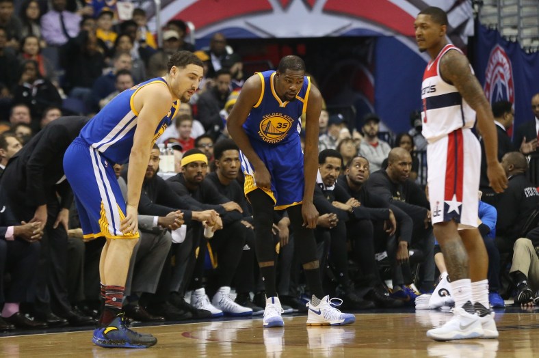 Feb 28, 2017; Washington, DC, USA; Golden State Warriors forward Kevin Durant (35) holds his knee after being injured against the Washington Wizards in the first quarter at Verizon Center. Mandatory Credit: Geoff Burke-USA TODAY Sports