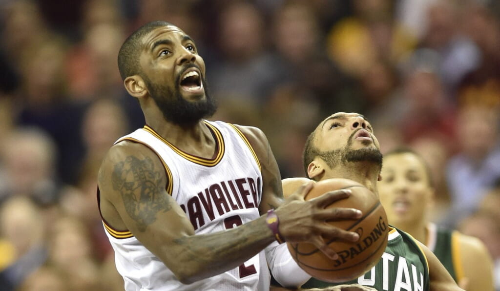 Kyrie Irving of the Cleveland Cavaliers gets sexy with Rudy Gobert of the Utah Jazz