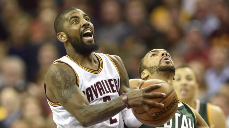 Kyrie Irving of the Cleveland Cavaliers gets sexy with Rudy Gobert of the Utah Jazz