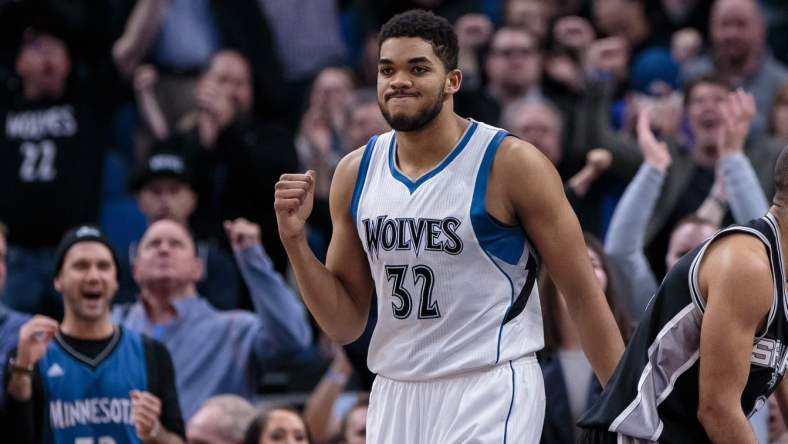 Mar 21, 2017; Minneapolis, MN, USA; Minnesota Timberwolves center Karl-Anthony Towns (32) celebrates his basket in the fourth quarter against the San Antonio Spurs at Target Center. The San Antonio Spurs beat the Minnesota Timberwolves 100-93. Mandatory Credit: Brad Rempel-USA TODAY Sports