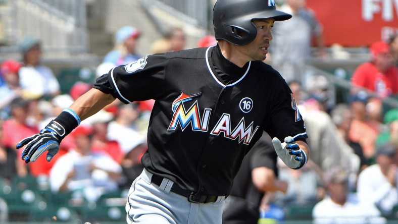 Mar 26, 2017; Jupiter, FL, USA; Miami Marlins right fielder Ichiro Suzuki (51) connects for a base hit against the St. Louis Cardinals during a spring training game at Roger Dean Stadium. Mandatory Credit: Steve Mitchell-USA TODAY Sports