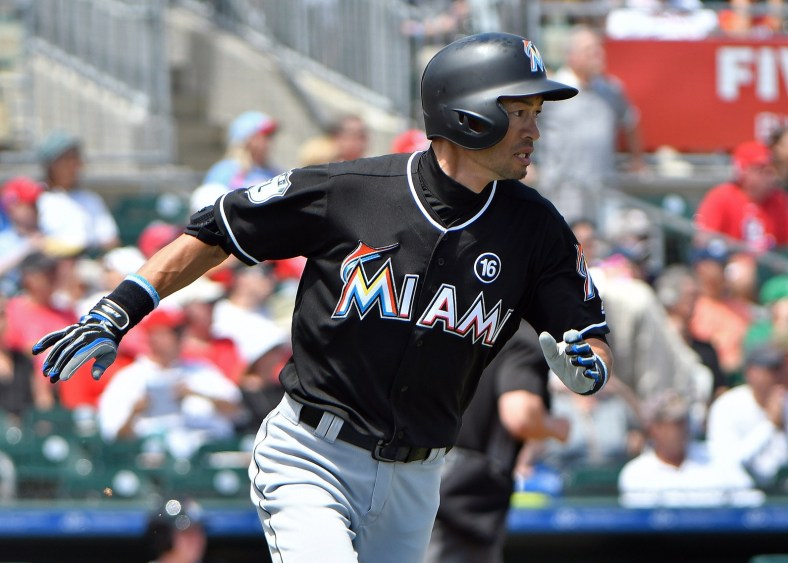 Mar 26, 2017; Jupiter, FL, USA; Miami Marlins right fielder Ichiro Suzuki (51) connects for a base hit against the St. Louis Cardinals during a spring training game at Roger Dean Stadium. Mandatory Credit: Steve Mitchell-USA TODAY Sports