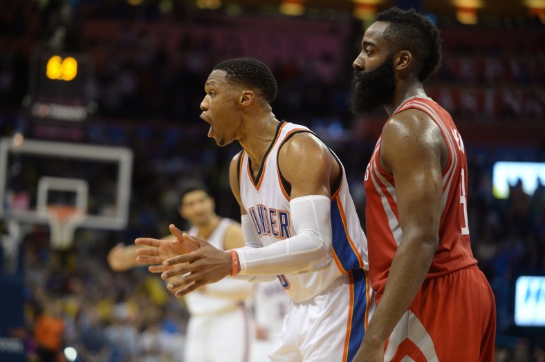 Caption: Nov 16, 2016; Oklahoma City, OK, USA; Oklahoma City Thunder guard Russell Westbrook (0) and Houston Rockets guard James Harden (13) react after a play against the Houston Rockets during the fourth quarter at Chesapeake Energy Arena. Mandatory Credit: Mark D. Smith-USA TODAY Sports