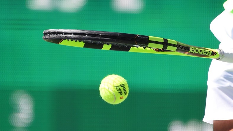 Caption: Mar 12, 2017; Indian Wells, CA, USA; Rafael Nadal (ESP) bounces the ball as he gets set to serve during his second round match as he defeated Guido Pella (not pictured) in the BNP Paribas Open at the Indian Wells Tennis Garden. Nadal won 6-3, 6-2. Mandatory Credit: Jayne Kamin-Oncea-USA TODAY Sports