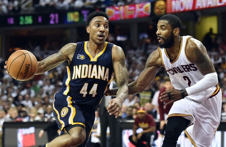 Caption: Apr 17, 2017; Cleveland, OH, USA; Indiana Pacers guard Jeff Teague (44) drives to the basket against Cleveland Cavaliers guard Kyrie Irving (2) during the first half in game two of the first round of the 2017 NBA Playoffs at Quicken Loans Arena. Mandatory Credit: Ken Blaze-USA TODAY Sports