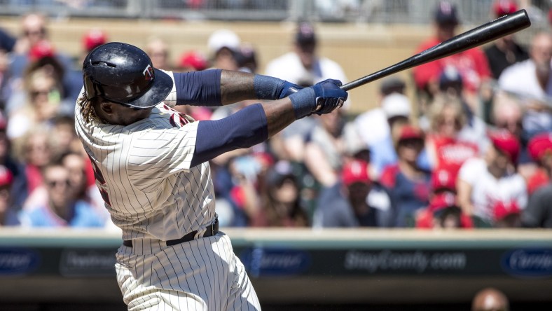 Apr 22, 2017; Minneapolis, MN, USA; Minnesota Twins first baseman Miguel Sano (22) hits a double in the first inning against the Detroit Tigers at Target Field. Mandatory Credit: Jesse Johnson-USA TODAY Sports