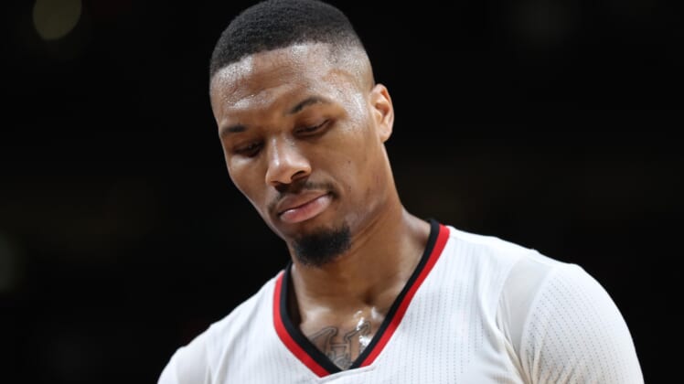 Apr 22, 2017; Portland, OR, USA; Portland Trail Blazers guard Damian Lillard (0) looks down in the second half of game three of the first round of the 2017 NBA Playoffs against the Golden State Warriors at Moda Center. Mandatory Credit: Jaime Valdez-USA TODAY Sports