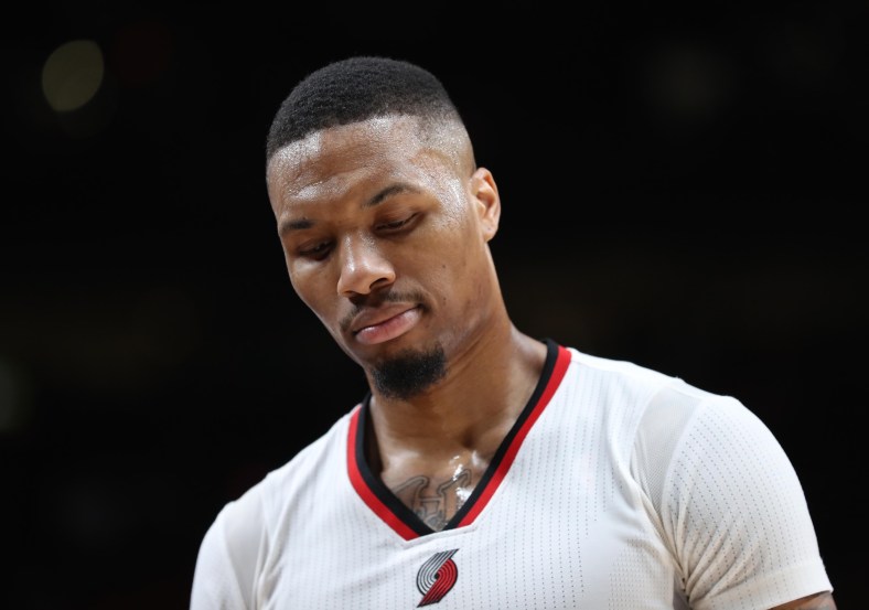 Apr 22, 2017; Portland, OR, USA; Portland Trail Blazers guard Damian Lillard (0) looks down in the second half of game three of the first round of the 2017 NBA Playoffs against the Golden State Warriors at Moda Center. Mandatory Credit: Jaime Valdez-USA TODAY Sports