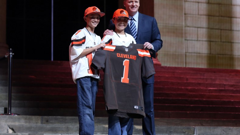 Apr 27, 2017; Philadelphia, PA, USA; NFL commissioner Roger Goodell (right) poses with 2 Cleveland Browns fans as Myles Garrett (Texas A&M), not pictured) is selected as the number 1 overall pick to the Cleveland Browns in the first round the 2017 NFL Draft at Philadelphia Museum of Art. Mandatory Credit: Bill Streicher-USA TODAY Sports