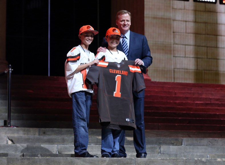 Apr 27, 2017; Philadelphia, PA, USA; NFL commissioner Roger Goodell (right) poses with 2 Cleveland Browns fans as Myles Garrett (Texas A&M), not pictured) is selected as the number 1 overall pick to the Cleveland Browns in the first round the 2017 NFL Draft at Philadelphia Museum of Art. Mandatory Credit: Bill Streicher-USA TODAY Sports