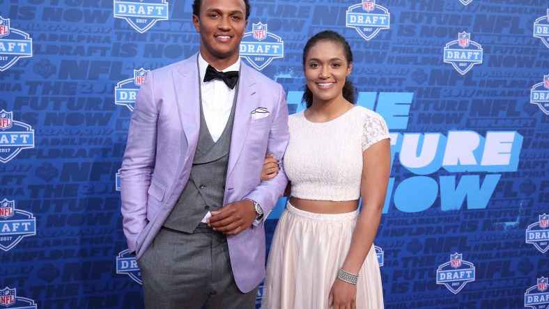 Caption: Apr 27, 2017; Philadelphia, PA, USA; Deshone Kizer (Notre Dame), left, on the red carpet before the start of the NFL Draft at Philadelphia Museum of Art. Mandatory Credit: Bill Streicher-USA TODAY Sports