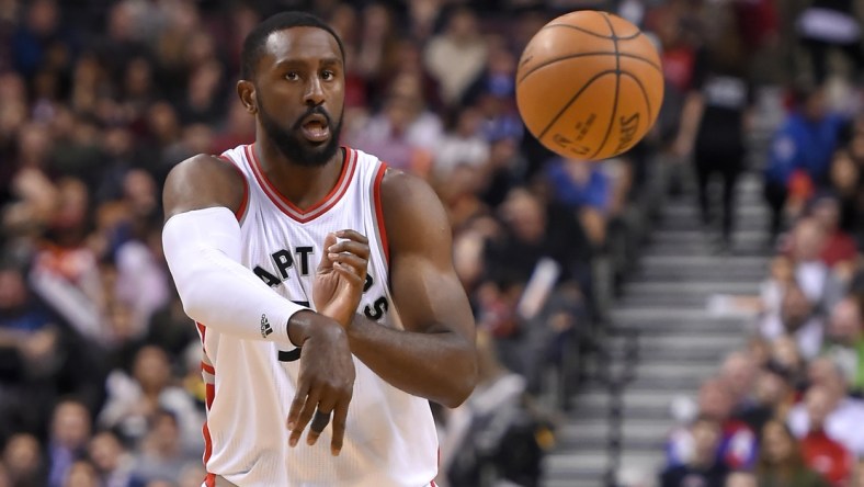 Mar 13, 2017; Toronto, Ontario, CAN; Toronto Raptors forward Patrick Patterson (54) makes a pass during the second half of a100-78 win over Dallas Mavericks at Air Canada Centre. Mandatory Credit: Dan Hamilton-USA TODAY Sports