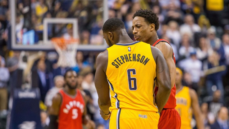 Caption: Apr 4, 2017; Indianapolis, IN, USA; Toronto Raptors guard DeMar DeRozan (10) gets into an altercation with Indiana Pacers guard Lance Stephenson (6) in the second half of the game at Bankers Life Fieldhouse. The Pacers beat the Raptors 108-90. Mandatory Credit: Trevor Ruszkowski-USA TODAY Sports