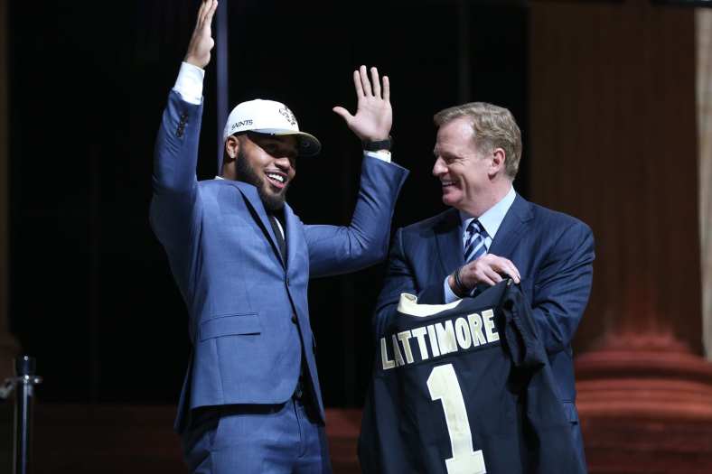 Apr 27, 2017; Philadelphia, PA, USA; Marshon Lattimore (Ohio State) reacts with NFL commissioner Roger Goodell (right) as he is selected as the number 11 overall pick to the New Orleans Saints in the first round the 2017 NFL Draft at the Philadelphia Museum of Art. Mandatory Credit: Bill Streicher-USA TODAY Sports