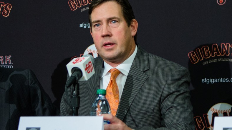 Dec 17, 2015; San Francisco, CA, USA; San Francisco Giants senior vice president and general manager Bobby Evans announces the signing of pitcher Johnny Cueto at a press conference at AT&T Park. Mandatory Credit: John Hefti-USA TODAY Sports