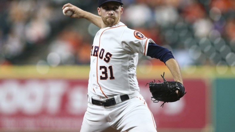 Sep 26, 2016; Houston, TX, USA; Houston Astros starting pitcher Collin McHugh (31) delivers a pitch during the first inning against the Seattle Mariners at Minute Maid Park. Mandatory Credit: Troy Taormina-USA TODAY Sports