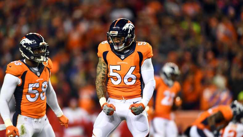 Nov 27, 2016; Denver, CO, USA; Denver Broncos outside linebacker Von Miller (58) and outside linebacker Shane Ray (56) react to a defensive stop in the first quarter against the Kansas City Chiefs at Sports Authority Field at Mile High. Mandatory Credit: Ron Chenoy-USA TODAY Sports