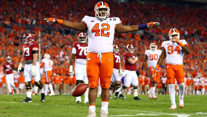 Jan 9, 2017; Tampa, FL, USA; Clemson Tigers defensive lineman Christian Wilkins (42) reacts after a defense play during the first quarter against the Alabama Crimson Tide in the 2017 College Football Playoff National Championship Game at Raymond James Stadium. Mandatory Credit: Mark J. Rebilas-USA TODAY Sports