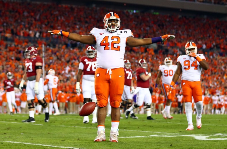 Jan 9, 2017; Tampa, FL, USA; Clemson Tigers defensive lineman Christian Wilkins (42) reacts after a defense play during the first quarter against the Alabama Crimson Tide in the 2017 College Football Playoff National Championship Game at Raymond James Stadium. Mandatory Credit: Mark J. Rebilas-USA TODAY Sports
