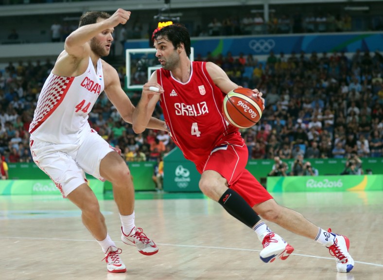 Aug 17, 2016; Rio de Janeiro, Brazil; Serbia point guard Milos Teodosic (4) drives to the basket against Croatia shooting guard Bojan Bogdanovic (44) during the men's basketball quarterfinals in the Rio 2016 Summer Olympic Games at Carioca Arena 1. Mandatory Credit: Jeff Swinger-USA TODAY Sports