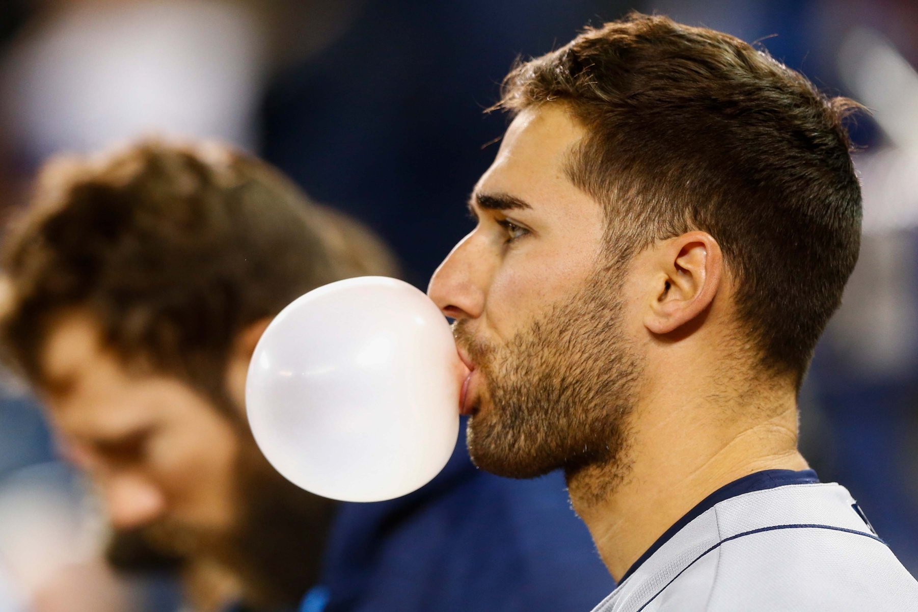 Apr 30, 2017; Toronto, Ontario, CAN; Tampa Bay Rays center fielder Kevin Kiermaier (39) blows a bubble during the national anthem prior to an MLB game against the Toronto Blue Jays at Rogers Centre. Mandatory Credit: Kevin Sousa-USA TODAY Sports