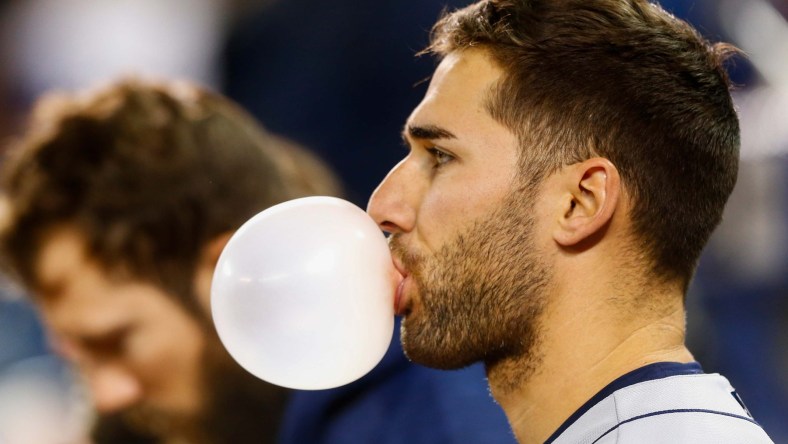 Apr 30, 2017; Toronto, Ontario, CAN; Tampa Bay Rays center fielder Kevin Kiermaier (39) blows a bubble during the national anthem prior to an MLB game against the Toronto Blue Jays at Rogers Centre. Mandatory Credit: Kevin Sousa-USA TODAY Sports