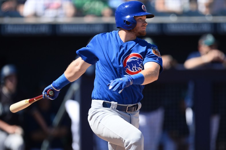 Mar 10, 2017; Peoria, AZ, USA; Chicago Cubs center fielder Ian Happ (86) hits a single against the Seattle Mariners during the second inning at Peoria Stadium. Mandatory Credit: Joe Camporeale-USA TODAY Sports