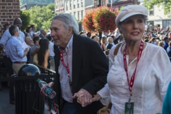 Caption: Jul 23, 2016; Cooperstown, NY, USA; Hall of Famer Brooks Robinson and his wife arrive at National Baseball Hall of Fame during the MLB baseball hall of fame parade of legends. Mandatory Credit: Gregory J. Fisher-USA TODAY Sports