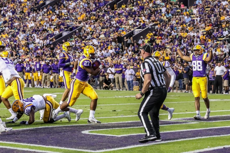 LSU running back Lanard Fournette reportedly arrested using a fake ID to gamble.