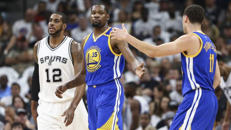 May 20, 2017; San Antonio, TX, USA; Golden State Warriors forward Kevin Durant (35) celebrates with guard Klay Thompson (11) after a play during the first quarter against the San Antonio Spurs in game three of the Western conference finals of the NBA Playoffs at AT&T Center. Mandatory Credit: Troy Taormina-USA TODAY Sports