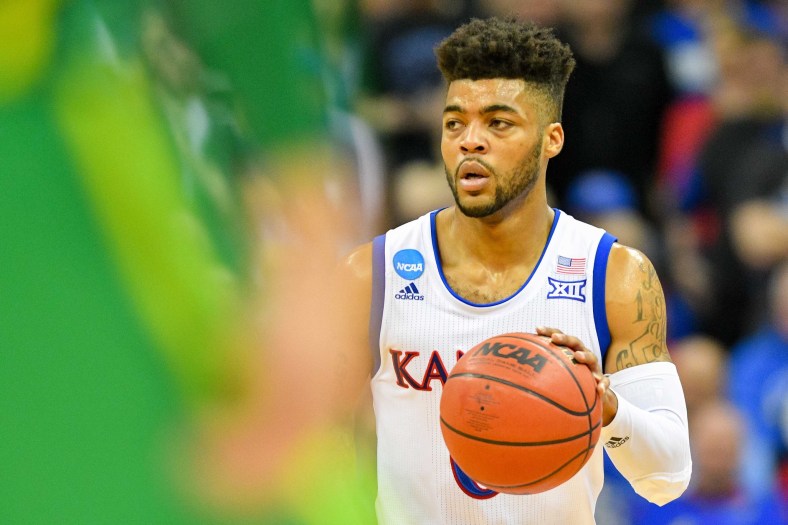 Mar 25, 2017; Kansas City, MO, USA; Kansas Jayhawks guard Frank Mason III (0) dribbles during the second half against the Oregon Ducks in the finals of the Midwest Regional of the 2017 NCAA Tournament at Sprint Center. Oregon defeated Kansas 74-60. Mandatory Credit: Denny Medley-USA TODAY Sports