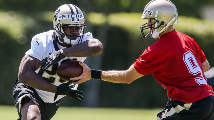 Adrian Peterson looks to rebuild his career with the Saints.