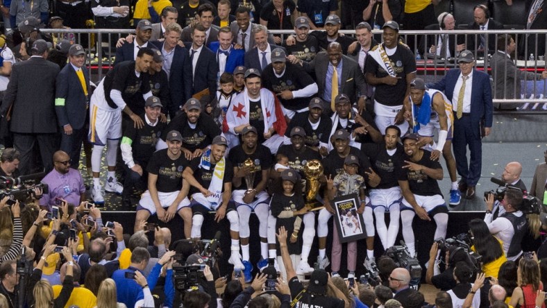 Warriors pose after winning the 2017 NBA Finals