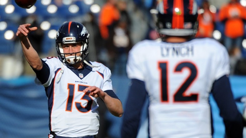 Paxton Lynch and Trevor Siemian warming up before a Broncos game