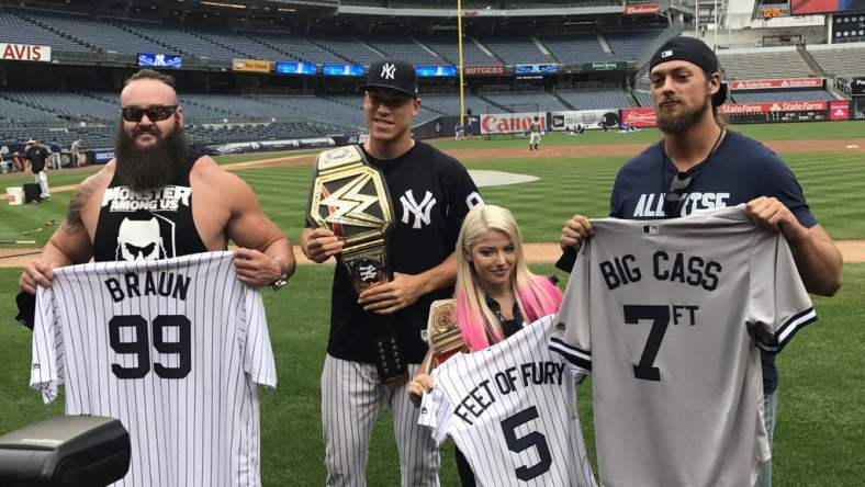 Aaron Judge receives championship belt from these WWE superstars.