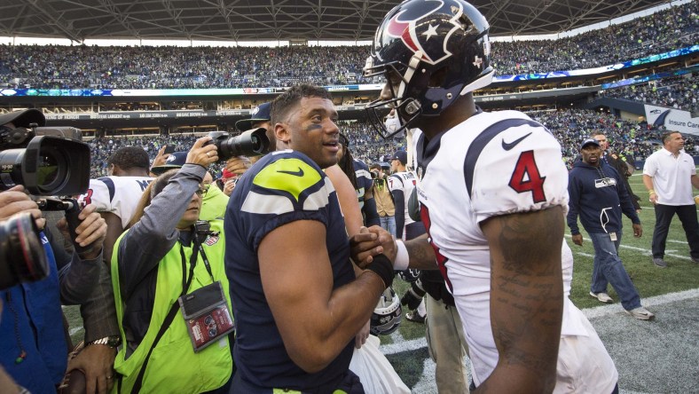 Russell Wilson and Deshaun Watson after a crazy game in NFL Week 8