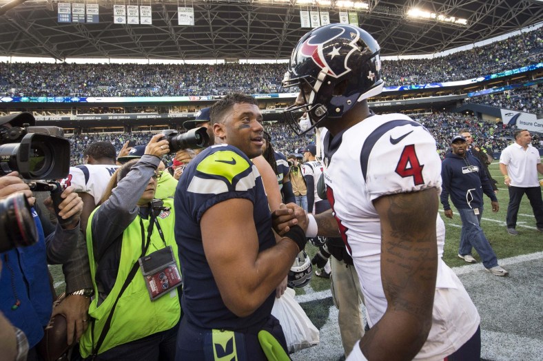 Russell Wilson and Deshaun Watson after a crazy game in NFL Week 8