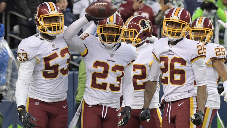 Redskins celebrate an interception against the Seahawks in NFL Week 9