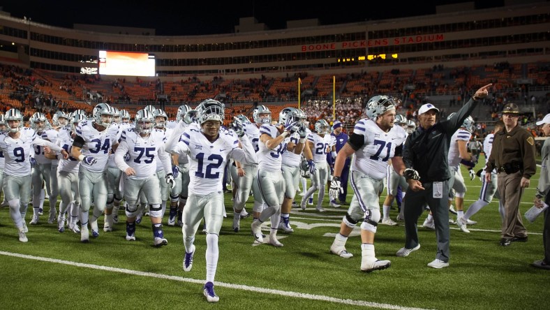 Kansas State Wildcats celebrate after beating the Oklahoma State Cowboys in college football Week 12