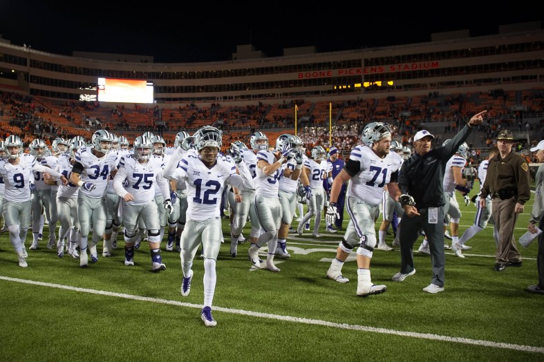 Kansas State Wildcats celebrate after beating the Oklahoma State Cowboys in college football Week 12