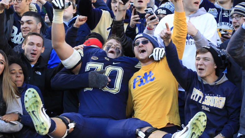 Pitt fans celebrate after the Panthers beat Miami on Black Friday