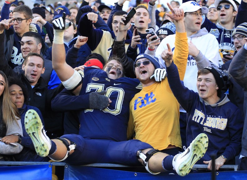 Pitt fans celebrate after the Panthers beat Miami on Black Friday