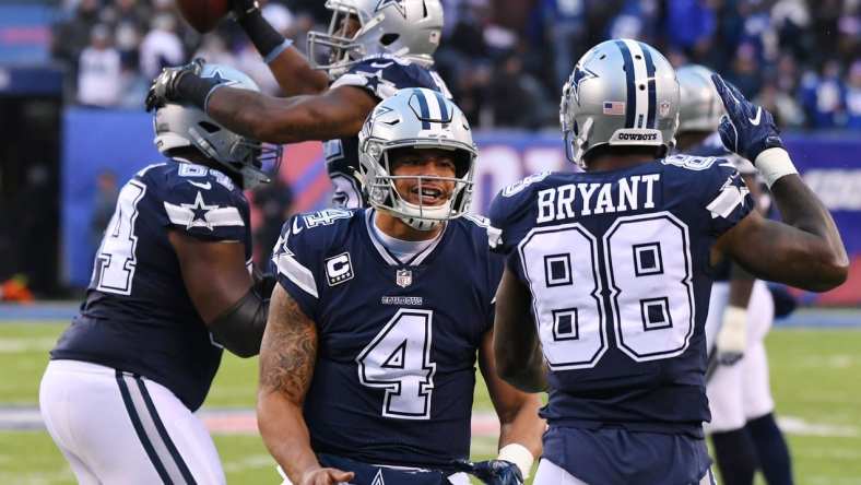 Cowboys celebrate with quarterback Dak Prescott