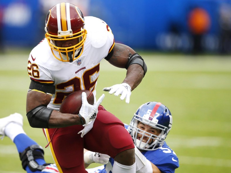 Adrian Peterson runs the ball against the New York Giants