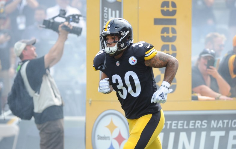 Pittsburgh Steelers running back James Conner runs onto the field