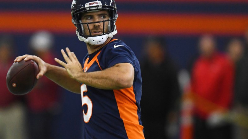 Joe Flacco throwing a pass as a member of the Denver Broncos